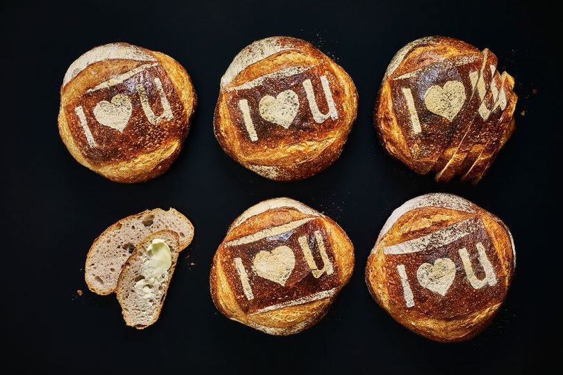Loaf of bread with 'I love you' written on it